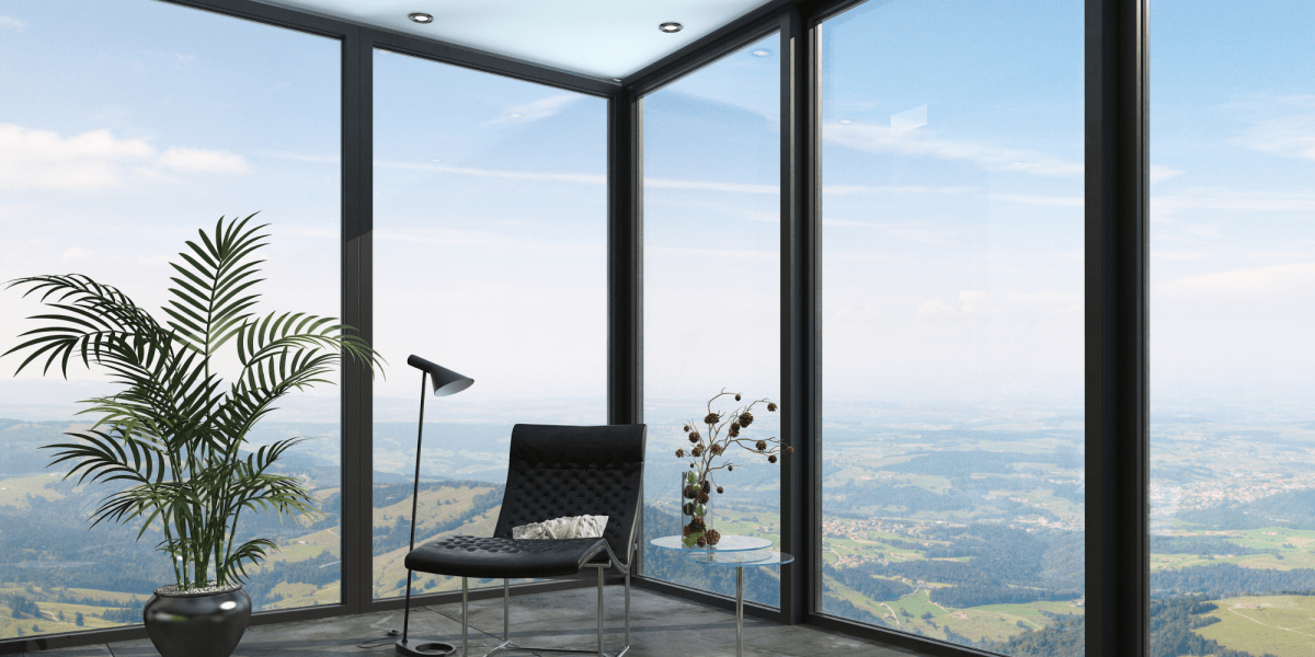 Ventana de cristal donde se puede apreciar las excelentes vistas en la parte alta de un edificio